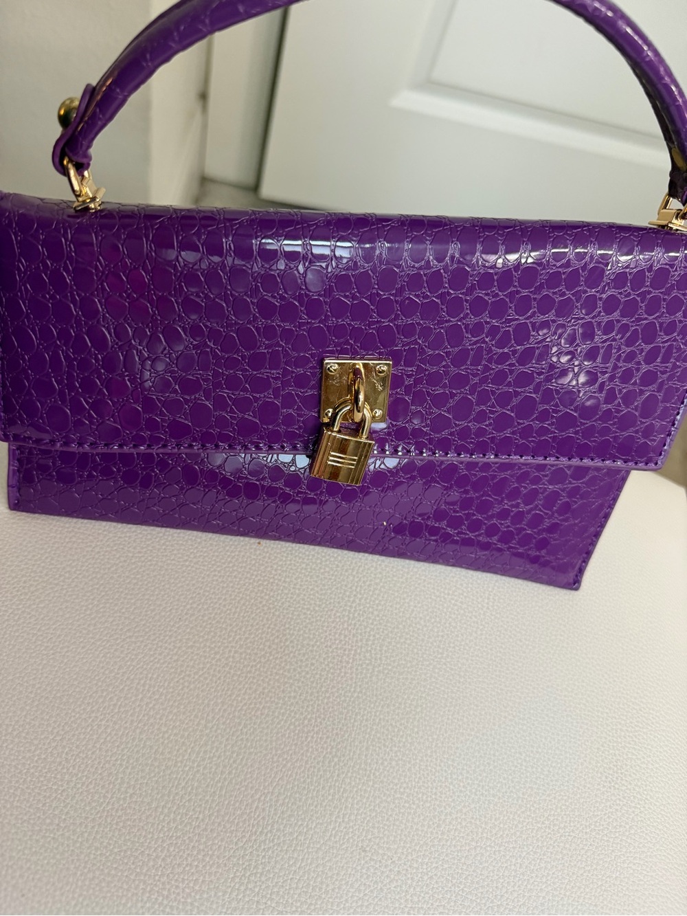 Top Handle Purple Patent Clutch